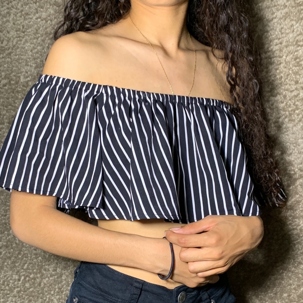 Off-shoulder crop top.